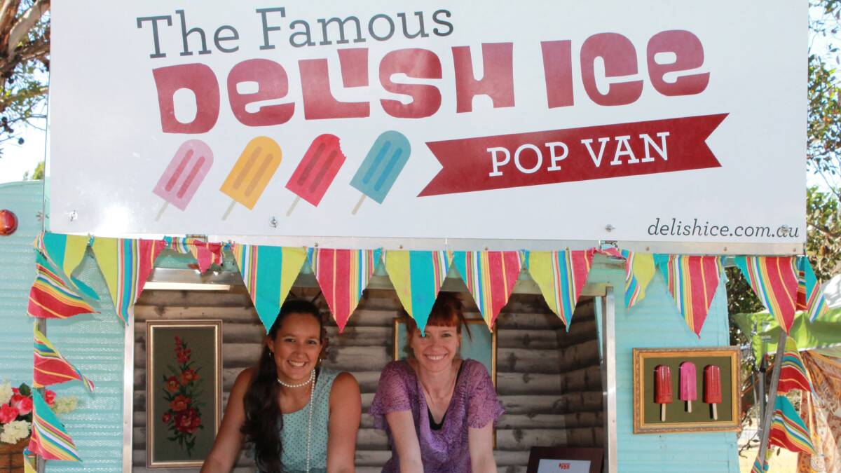 Camille Payet and Holly Jones keeping the festival-goers cool with icy poles. 