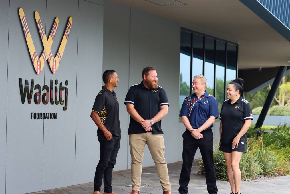 Boost for Indigenous employment opportunities: Waalitj Foundation director Troy Cook and employees Ben Webb and Sandra Simpson with Alcoa Australia employee relations director Matthew Gleeson. Picture: supplied 