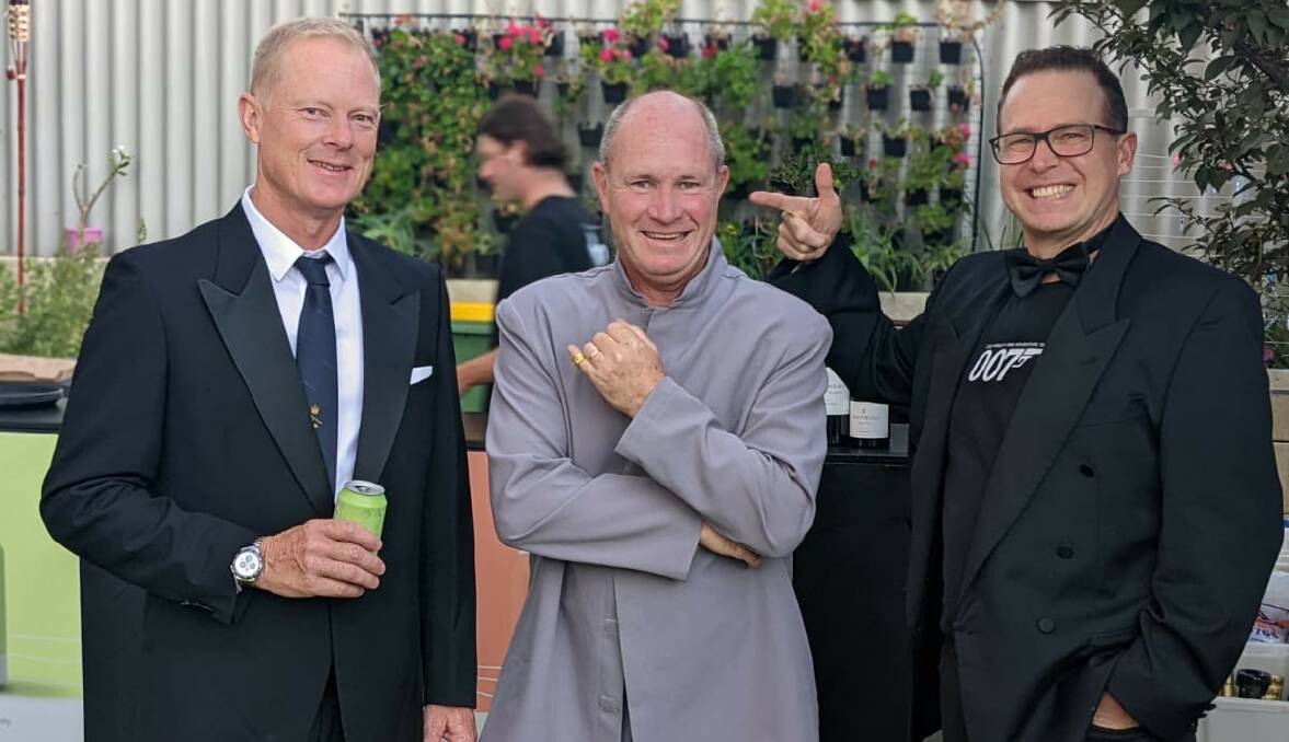 Team mates: Grant Betts, David Eyers and David Egerton-Warburton dressed 007 style to fundraise for Variety. Picture: Supplied.