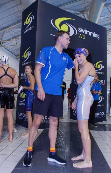 Winner: Scarlett Riddle,14, was congratulated by head coach Andrew Sexton after she took Gold for both the 50m and 100m breaststroke. Picture: Supplied.