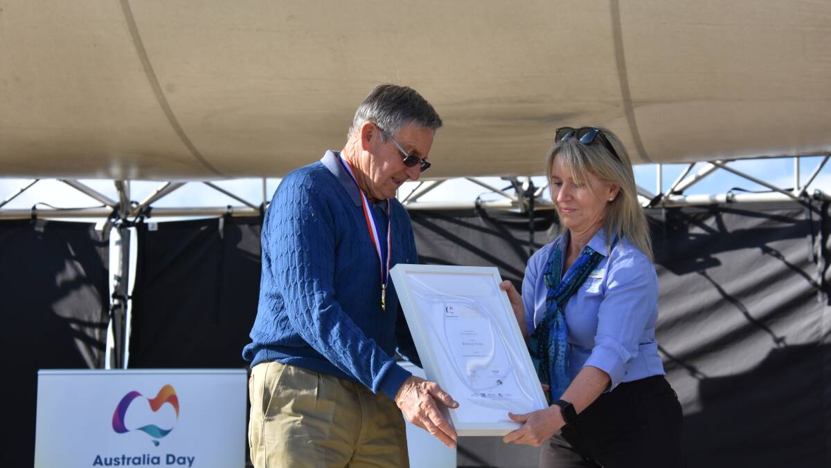 Ronald York being presented with his Busselton Citizen of the Year Award by deputy mayor Kelly Hick. 