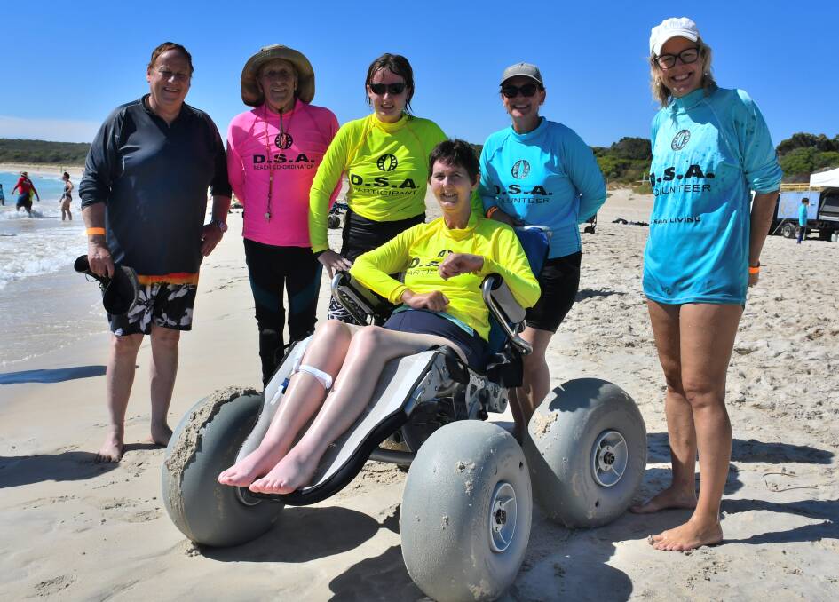 Disabilities Minister Don Punch, DSA president Ant Purcell, stoked surfers and volunteers and MP Libby Mettam.