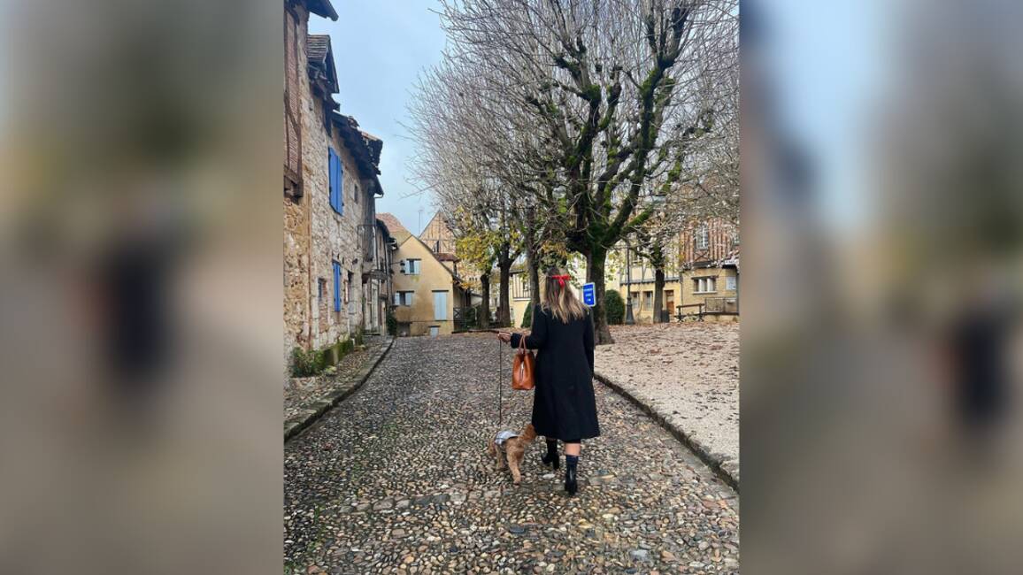 Brittany Higgins walks her dog in France. Picture by Instagram/@brittanyhiggins___