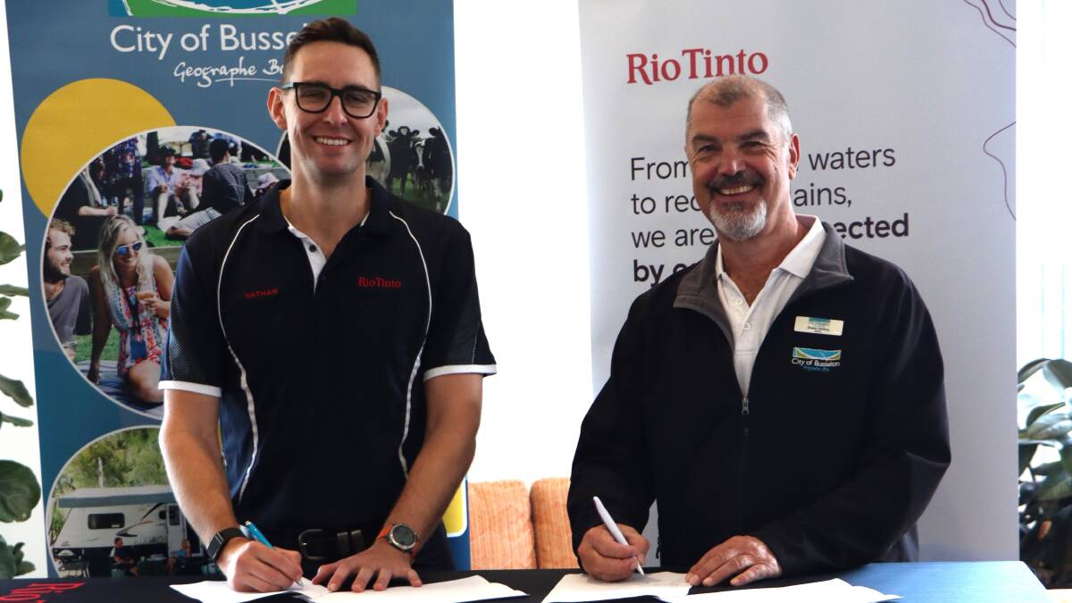 General Manager of Hope Downs, Nathan Jacobs and City of Busselton Mayor Grant Henley re-sign their Memorandum of Understanding. Picture supplied.