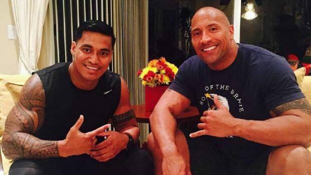 Family values: Junior Vaivai with cousin Dwayne "the Rock" Johnson. Photo: Supplied
