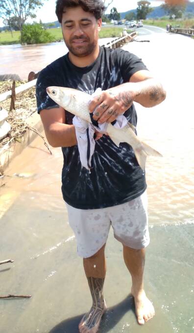 GOOD CATCH: Campbell Horua with his flood catch last week. Photo: Supplied
