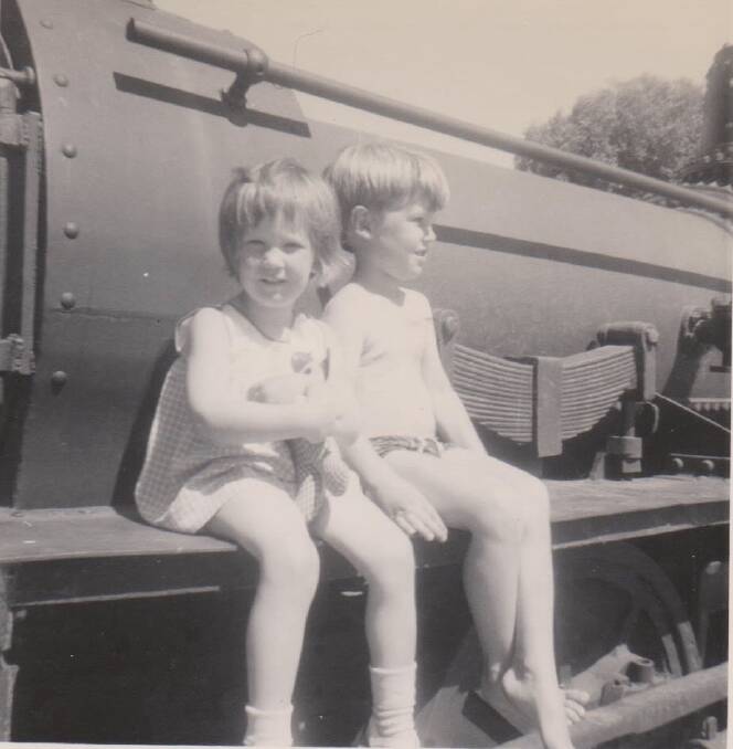Busselton Mayor Grant Henley (aged five) and his sister Andrea (aged three) during a visit to Busselton from Hobart in December 1970 playing on the Ballaarat when it was located in Victoria Square. Image supplied.