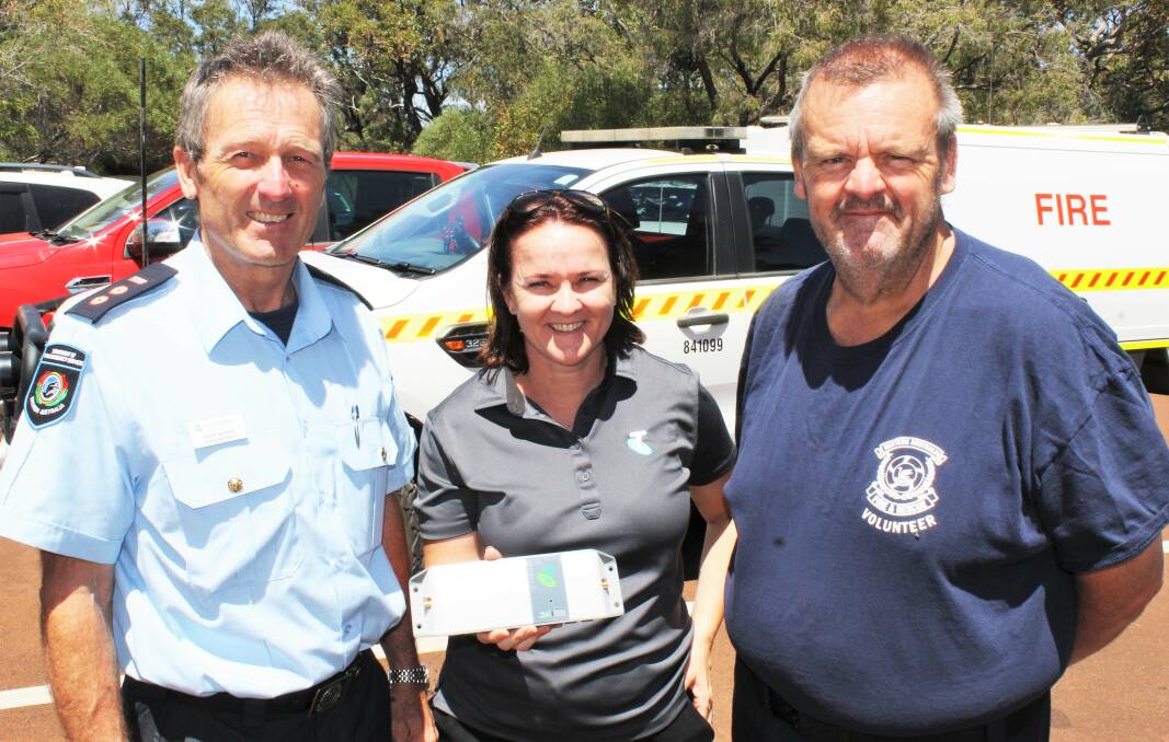 Department of Fire and Emergency Services acting area officer for Leeuwin Mark Norris with Telstra business development manager Naomi Evans and volunteer Leith Jones.