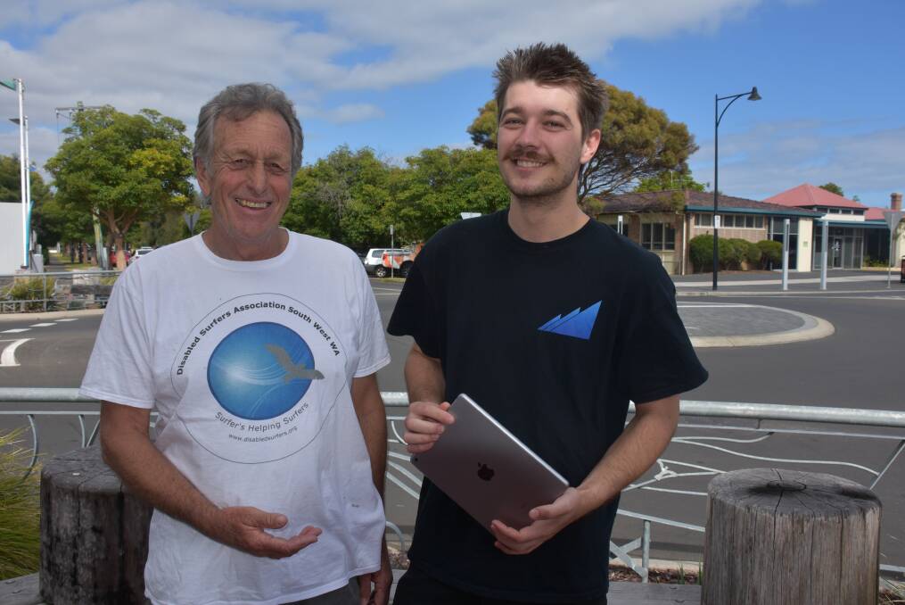 Disabled Surfing Association South West president Ant Purcell and Down South Graphic Design designer Ethan Ashton.