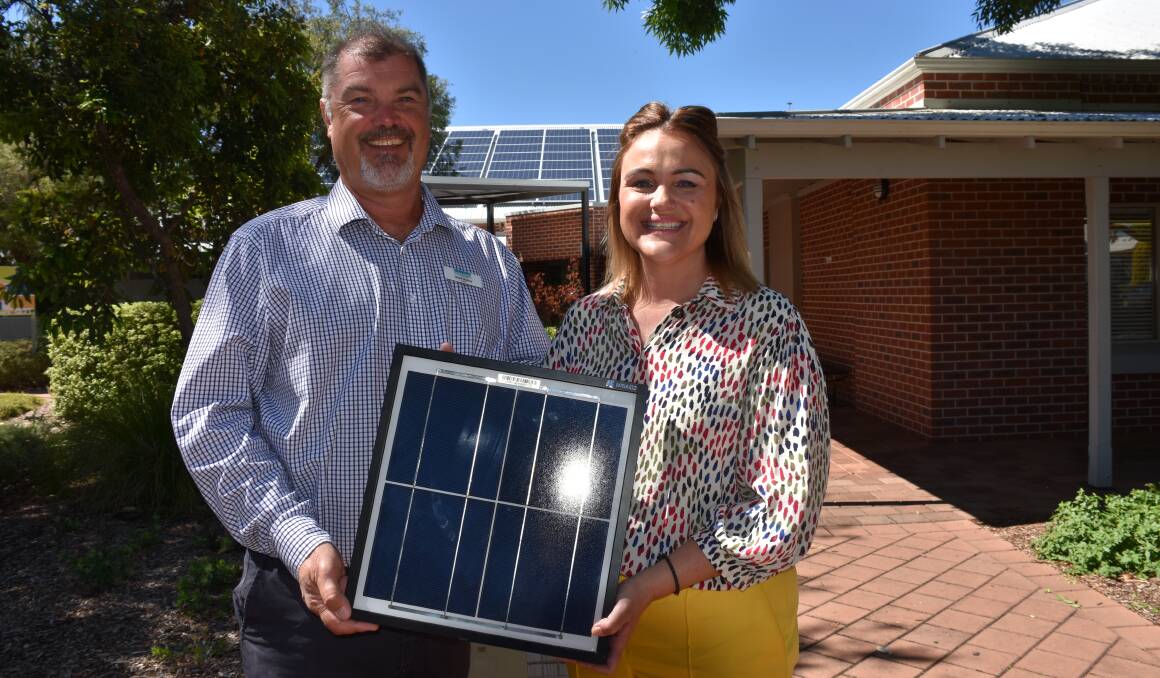 City of Busselton mayor Grant Henley and West Australian Alternative Energy co-owner Sarach Barclay at the Busselton Library which has just had solar panels installed.