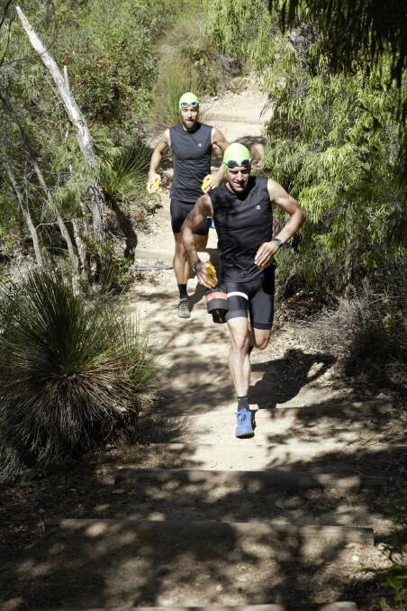 Margaret River resident Aaron Milward Dunsborough's Garry Dagg training for the Trans Cape Swim Run in March. Image supplied.