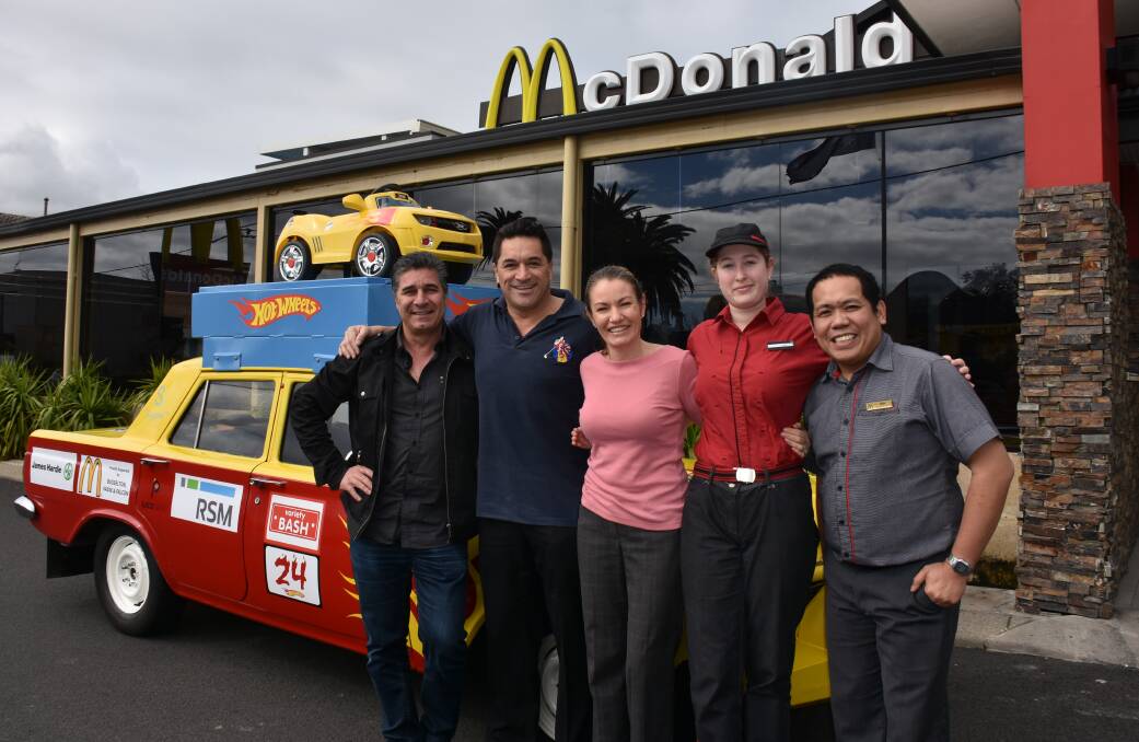 Hot Wheels owner Joe D'Agostino, McDonald's owners John Frankham and Megan McMullen, McDonald's crew person Jamie Bielby and store manager Michael Delaroca.