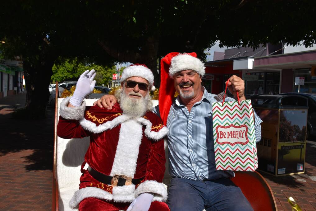 The City of Busselton mayor Grant Henley greeted Santa Claus upon his arrival in Busselton on Thursday. Santa was in town to meet with children ahead of his global tour on Christmas Eve.
