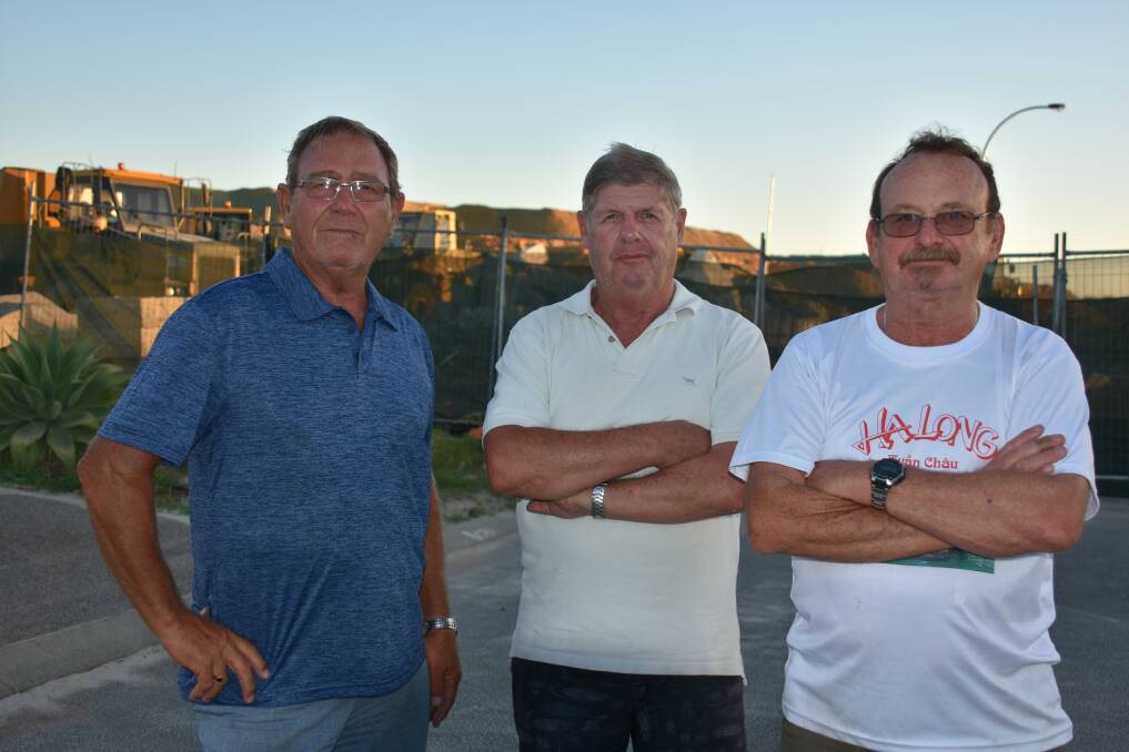 Geographe residents Peter Clifford, John Pirrit and Dale McCamish are fed up with sand blowing into their properties from a neighbouring development.
