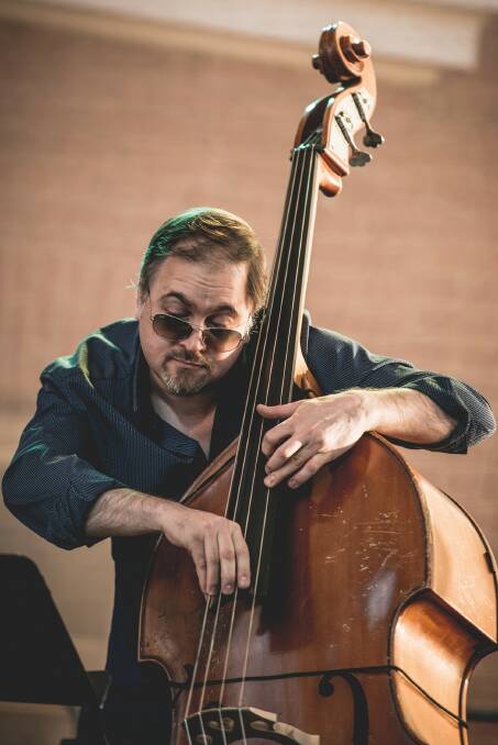 Pete Jeavons strumming his double bass, will play six gigs at this year's Jazz by the Bay. Photo by Corey James.