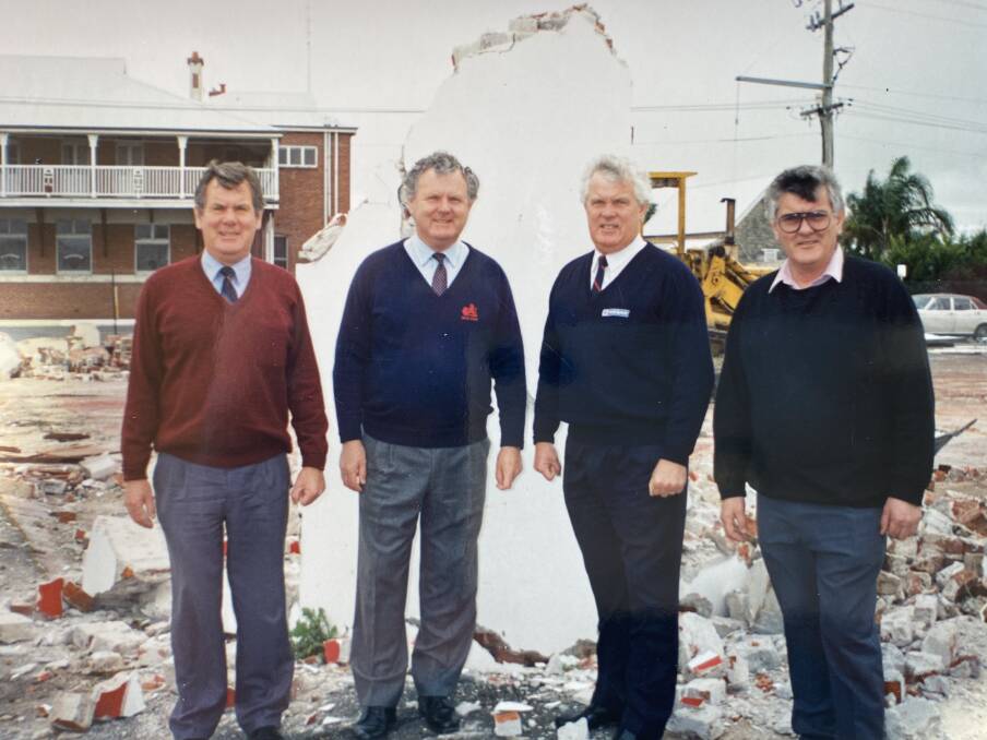 Dick, Mike, Peter and John Fennessy at the old Plume service station on the corner of West Street and the Bussell Highway in Busselton. Image supplied.