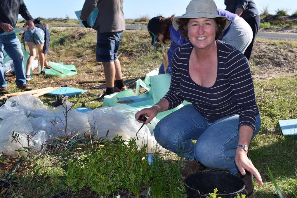 GeoCatch project officer Lisa Massey helped the community plant more than 1000 seedlings along the Dolphin Road Foreshore.