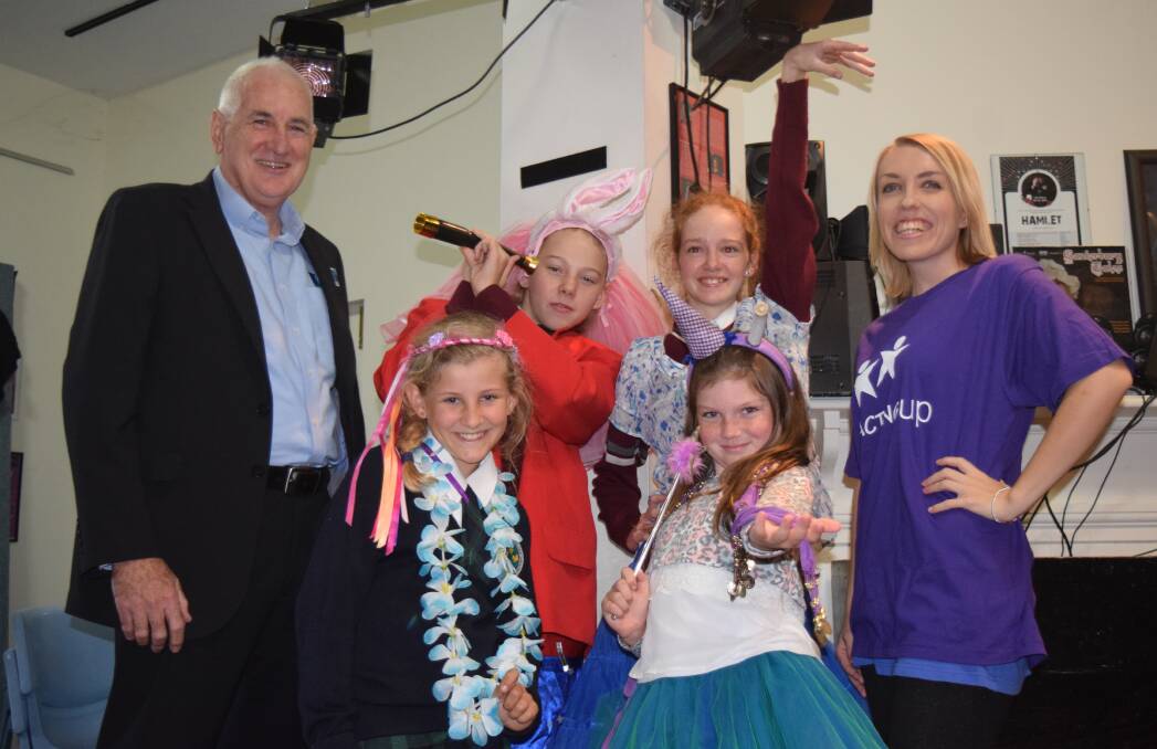 Busselton Water chief executive officer Chris Elliot, Emily Lyons, Ella Demarchi, Molly Tompsett and Anouk Siegrist with their musical teacher Emma.