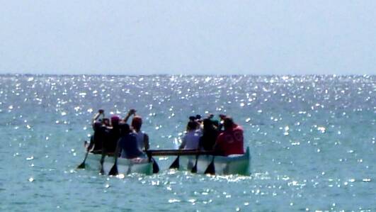 Geographe Outriggers paddling out to see the whales off Eagle Bay. Image supplied.