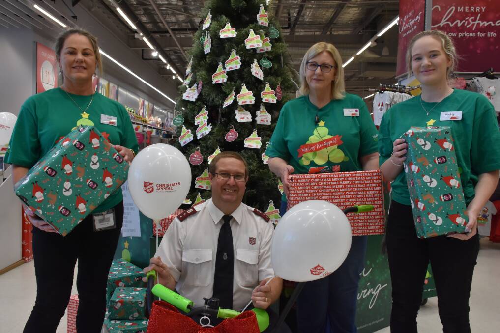 Kmart Wishing Tree ambassadors Pam, Cindy and Maddy with Salvation Army Busselton Corps captain Mark Schatz.
