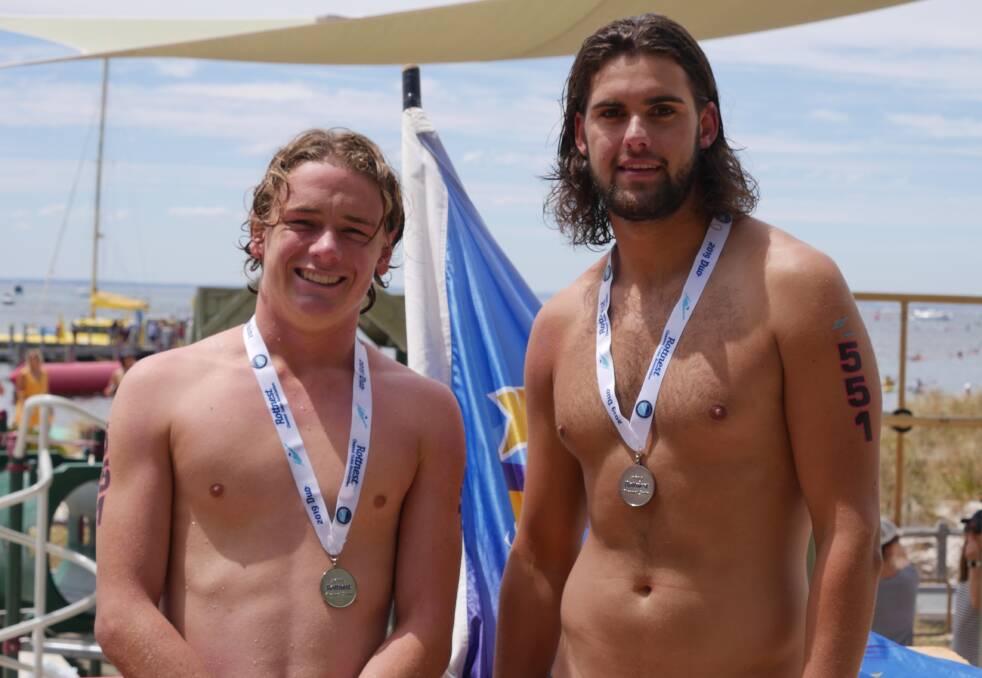 Busselton Surf Lifesaving Club members Mitchell Rabjones and Angus Johnston-Walker competed in their first Rottnest swim finishing in just over five hours.