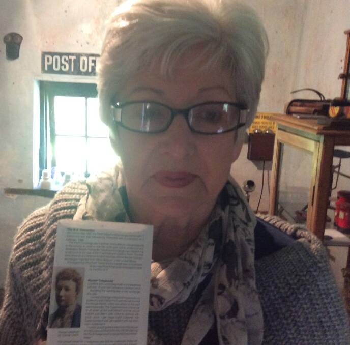 Geraldine Ogilby is pictured with a copy of the pamphlet featuring her grandmother Constance Letch in the old Quindalup post office.