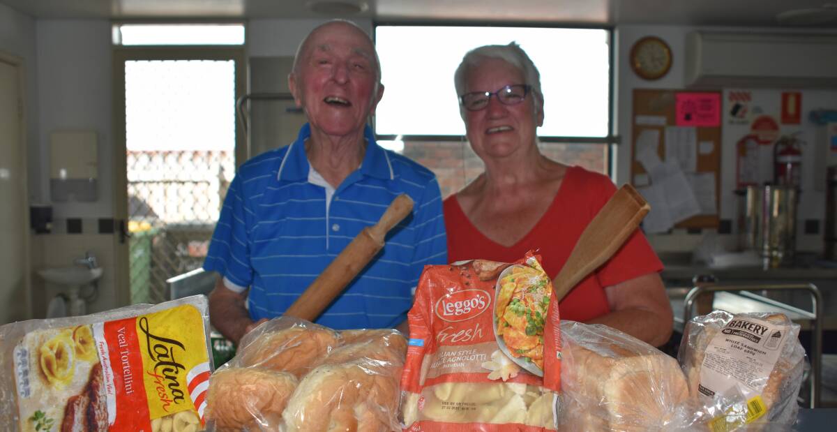 Cliff's Kitchen coordinators John Morris and Kerry Bailey prepare takeaway service to feed Busselton residents who are doing it tough.