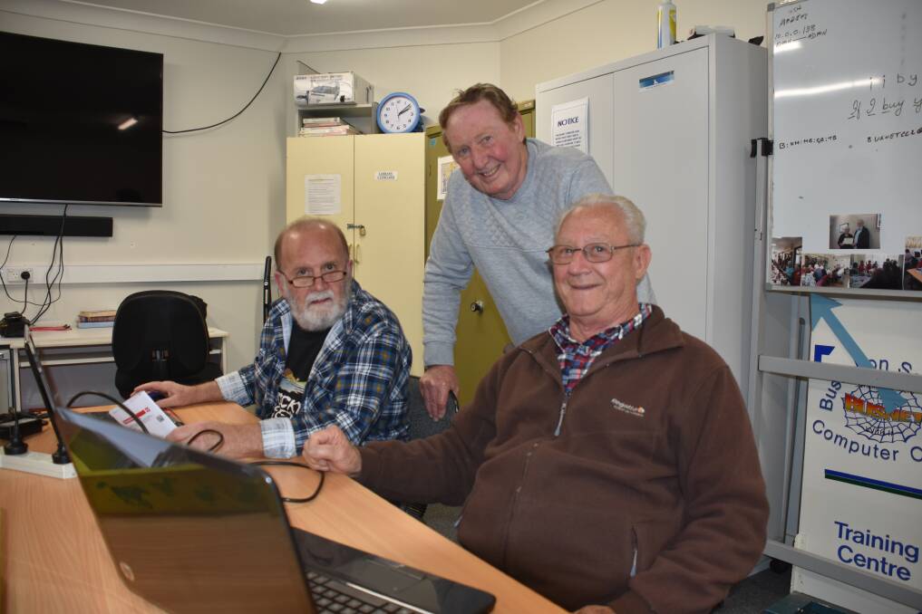 Bill Whipp, Peter Ralph and Colin Phillips at the Busnet Club at Bussselton Senior's Citizen Centre help older residents navigate digital technology.
