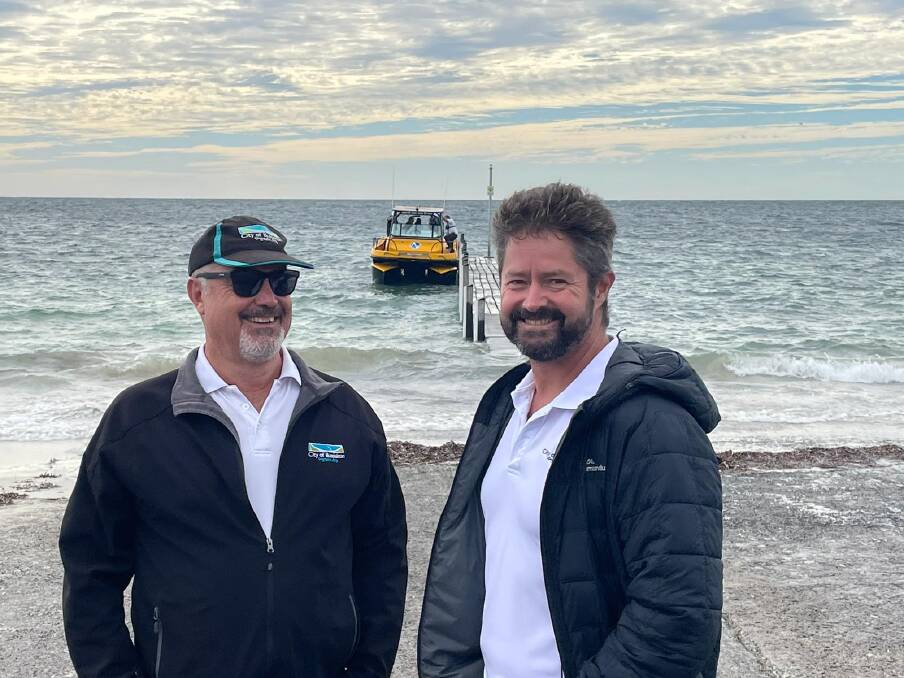 City of Busselton mayor Grant Henley and councillor Paul Carter with Nauti-Craft's Suspension Boat 2Play. Image supplied.