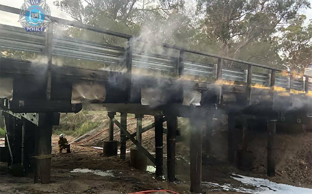 A bridge on Tuart Drive in Wonnerup was destroyed by fire on March 25,2020 when a car was allegedly set on fire near the bridge and spread. Image supplied.