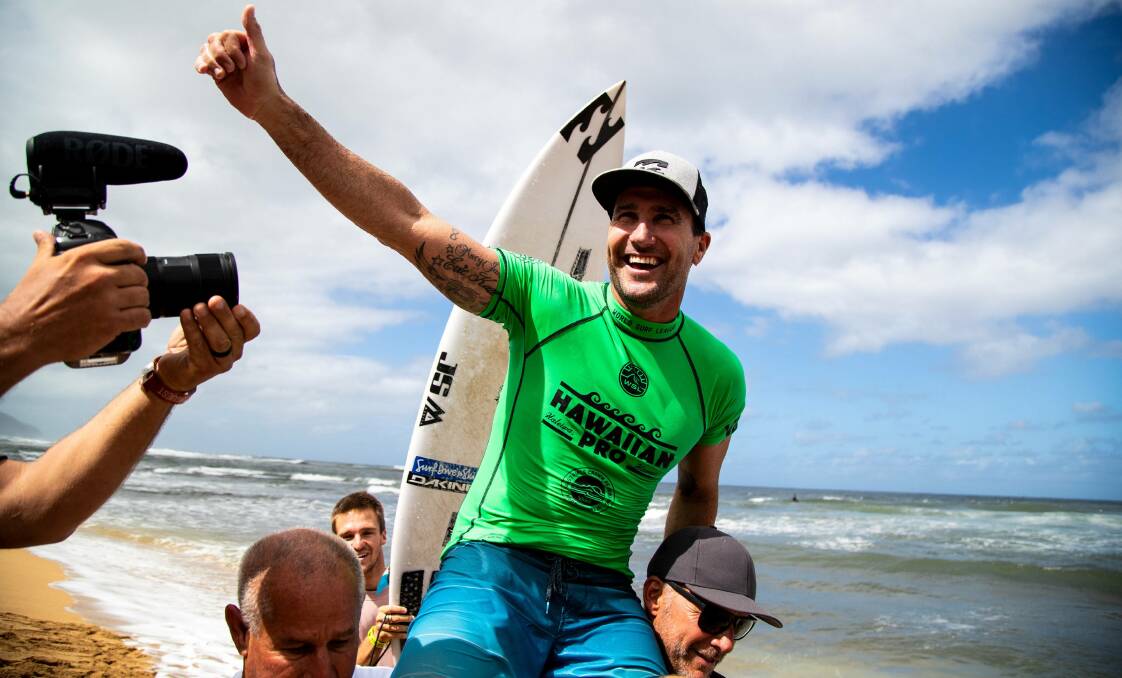 Celebration: Joel Parkinson has won this year's Hawaiian Pro in Haleiwa just before his retirement as a pro surfer. Photo: Supplied. 