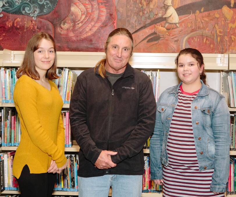 Tim Winton with Busselton finalists Indigo Atkinson and Aimee Telford. The writer announced the award winners during a ceremony in Subiaco. Photo supplied.