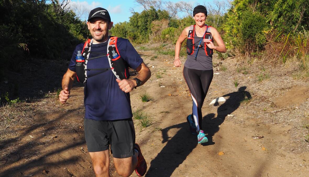 Martin Tonna and Bec Hannan preparing for the 135km run from Cape to Cape they plan to complete in 24 hours. They decided to turn their all-day challenge into a fundraiser to raise funds for YouthCARE Australia. Photo by Lily Yeang.