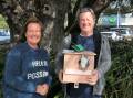TAKING ACTION: Possum box winner Steve receives his prize from Nicole Lincoln. Picture: Supplied.