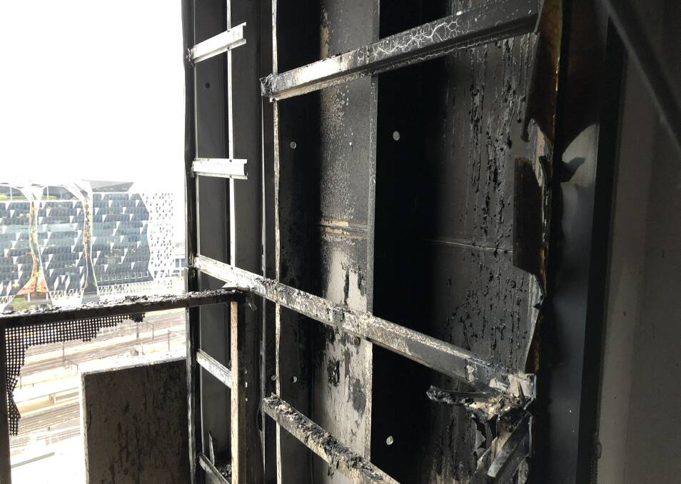 Combustible cladding is a fire risk and was blamed for this Melbourne apartment fire this year - but you're not allowed to know where it is.