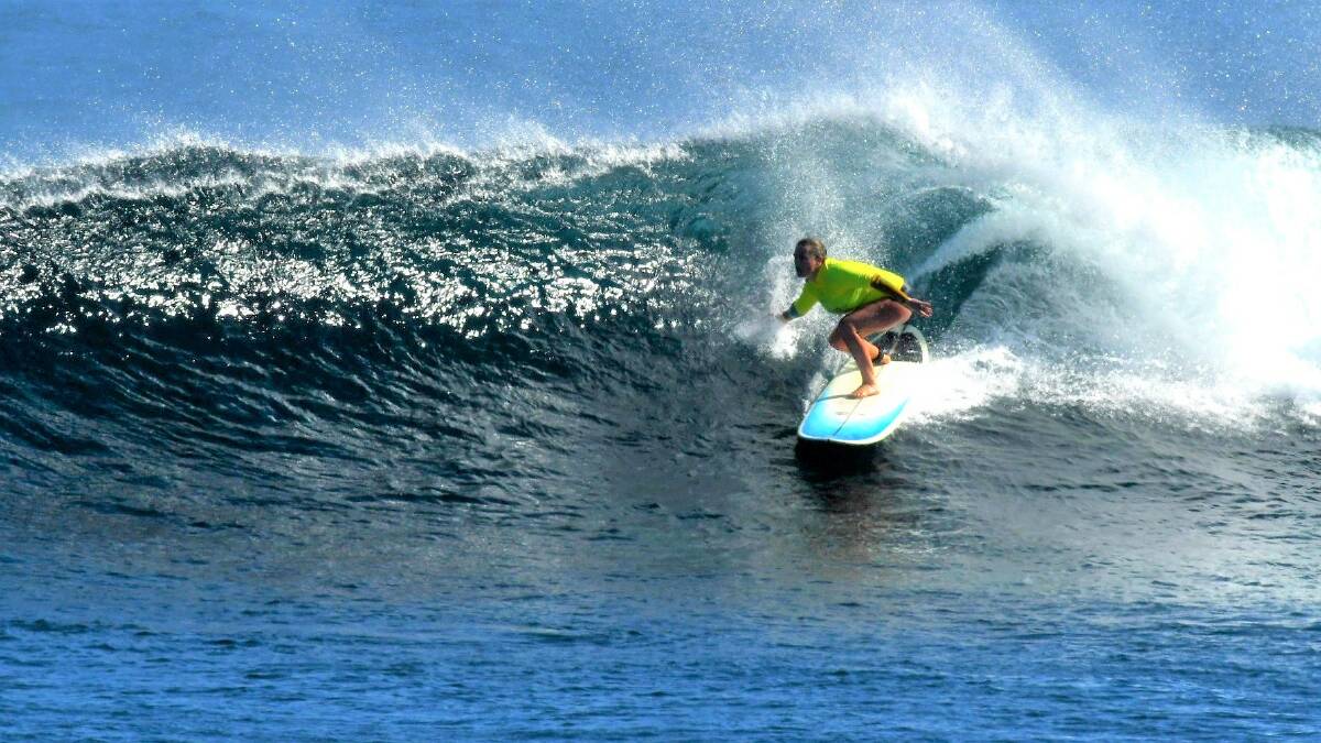 Indian Ocean Longboard Club member Shae Sheridan hit the waves for the first session of 2020. Photo by Mick Marlin.