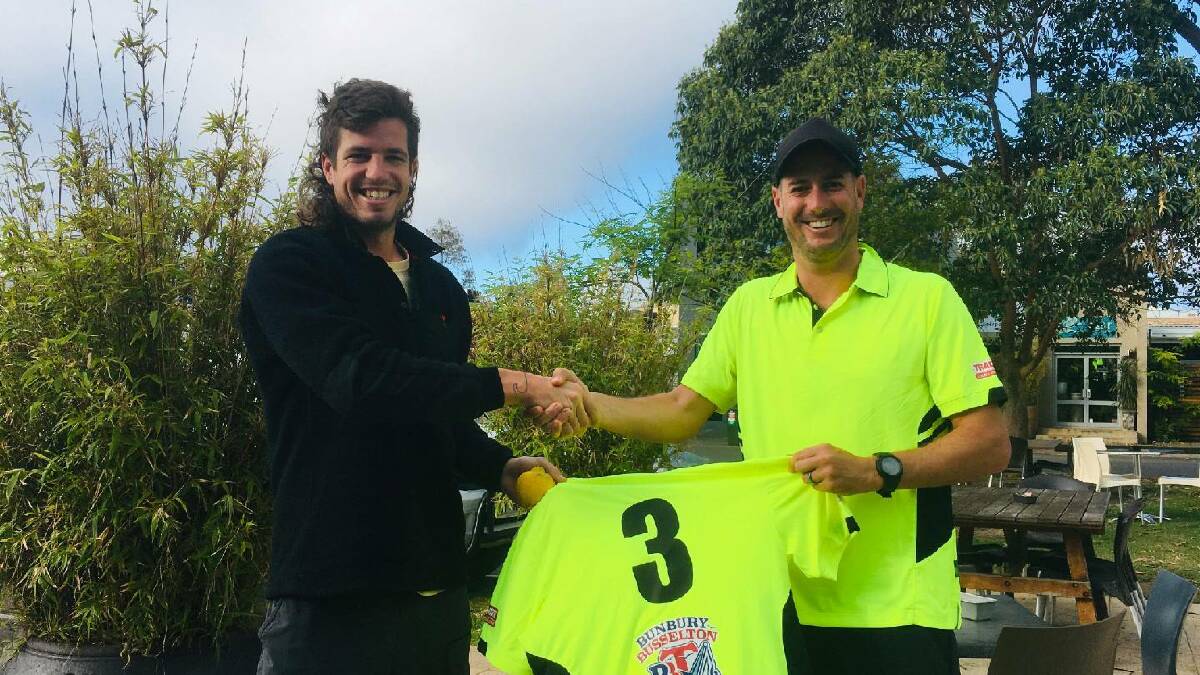 Lemons' Ben Horrocks presenting Hawthorn defender Ben Stratton with his very own Lemons shirt. Photo is supplied.