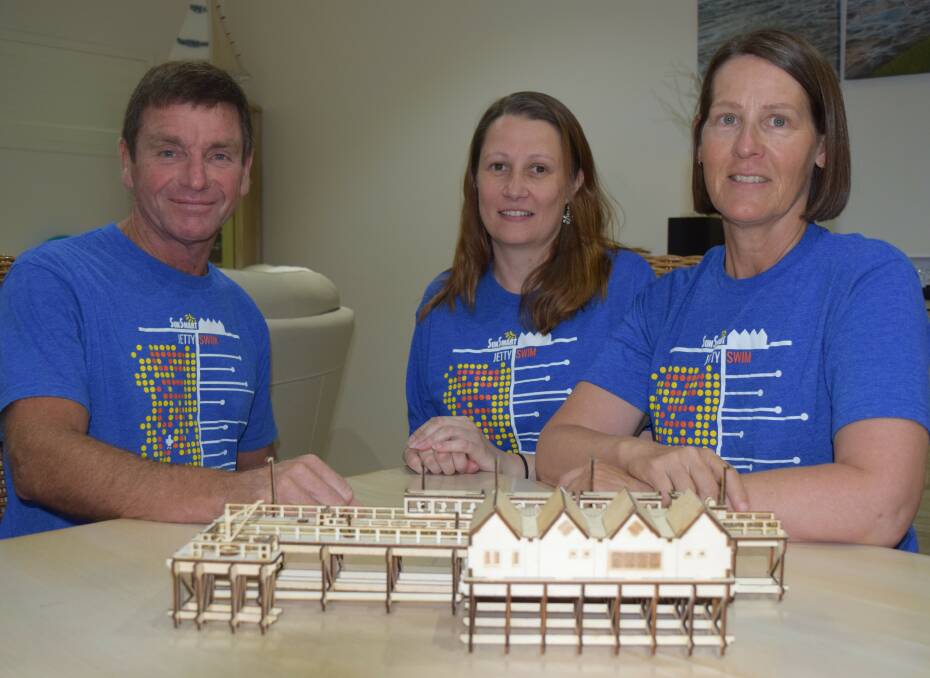 Max Higgins, Clare Anderson, Wendy Paine are all Busselton Allsports Inc. committee members showcasing the replica Busselton Jetty sea huts that will be on display at the Exhibition. Photo supplied.