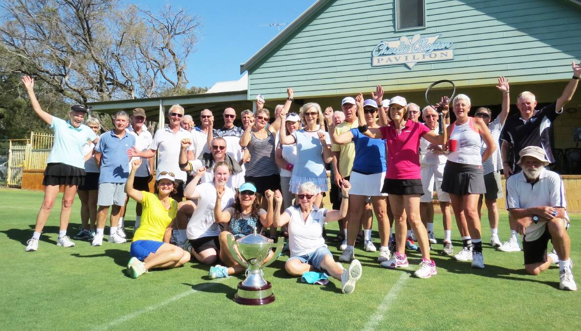 CUP GLORY: Busselton Tennis Club members welcome the Hopman Cup on Saturday. Members and visitors were intrigued by the hardware that the world’s top tennis nations will compete for in January. Photo by Michelle Reilly.