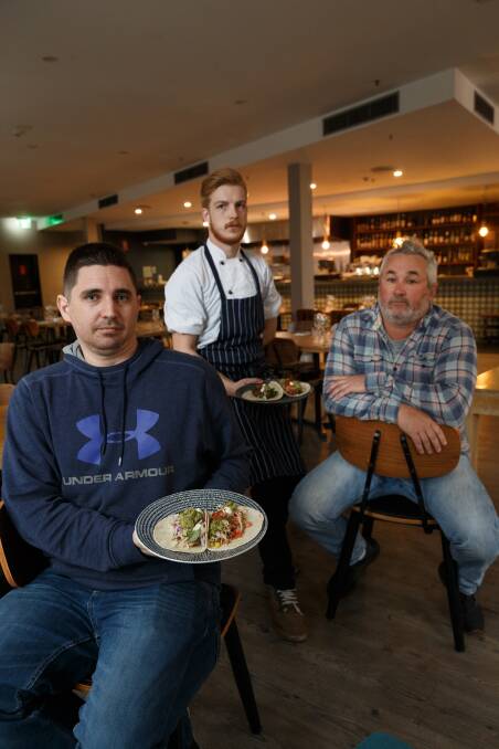 FED UP: Owners Mark Chegwidden and Tom Brown with sous chef Nick Writer. Picture: Max Mason-Hubers