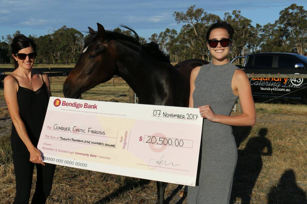 Laundry 43 manager Karis Silke, Lulu the horse and Busselton Conquer Cystic Fibrosis advocate Jackie Hodson with a cheque from the Melbourne Cup Day event. Image supplied.