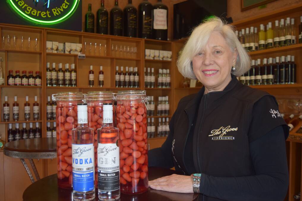 The Grove Distillery's Val Hughes with just some of the strawberries that will be used for a special range of products being created to show support for strawberry growers. 