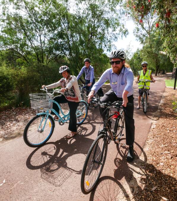 City of Busselton's Dave McKenna leads Jacquie Happ, Ben Whitcomb and Lorraine Campbell in a bike ride. Image supplied.