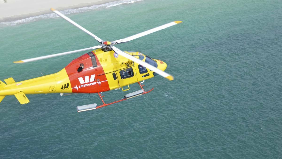 The helicopter spotted the shark just 100 metres offshore. Stock Image.