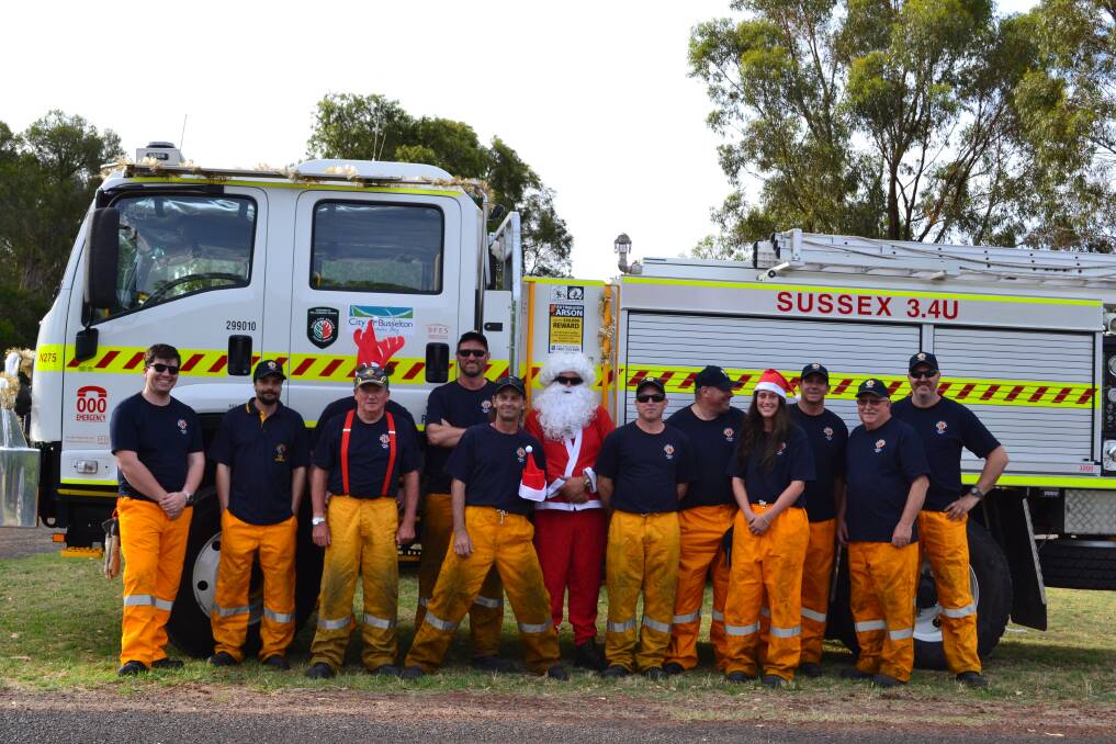 Sussex Volunteer Bush Fire Brigade and Santa made some local children very happy with some sweet treats just prior to Christmas. Image Kristy Coppendale.