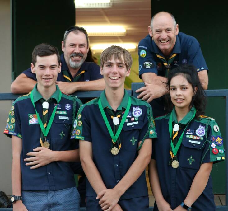Scott McKay and Andrew Robinson with scouts  Matthew Robinson, Zac Richards and  Kiran Van der Tang. Image supplied.