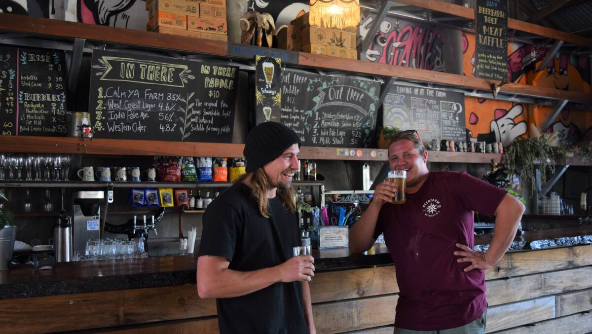 Fervor executive chef Paul ‘Yoda’ Iskov and Beerfarm brewer Josh Thomas enjoy a pint ahead of their collaboration dinner and the launch of their fifth beer. Image Sophie Elliott.
