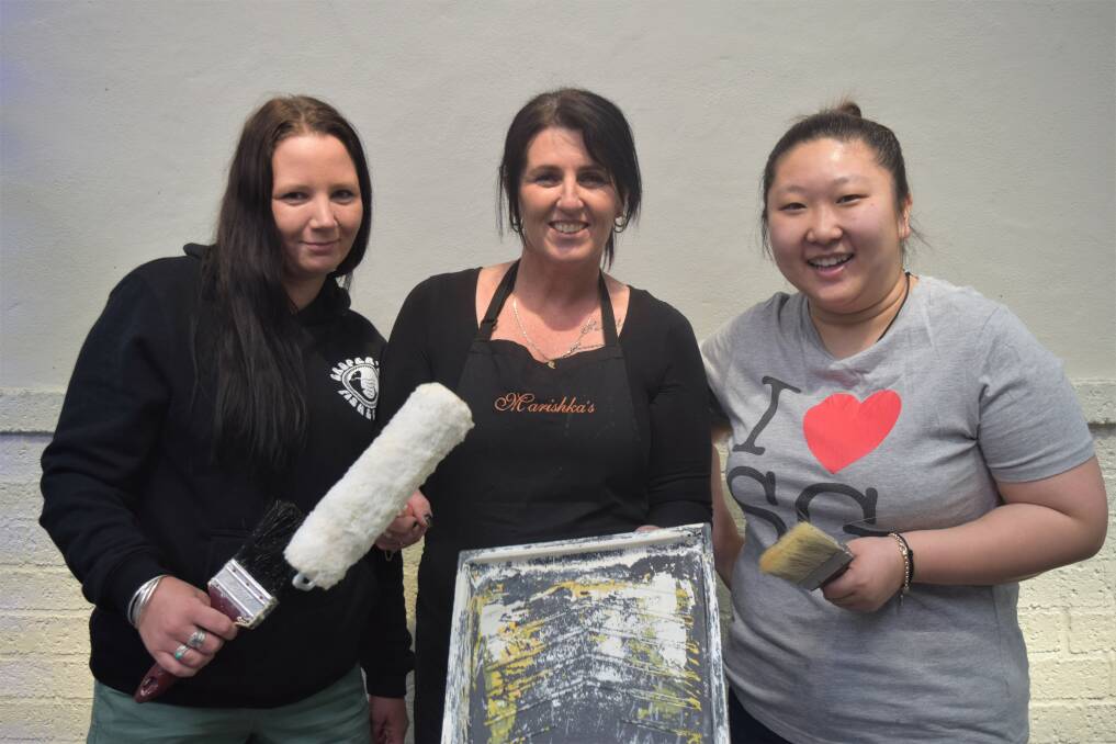 Gropers Fish and Chips owner Kirsty Wood, Marishkas cafe owner Melissa Drake and Friendo Chinese's Nikkie Wang are keen to see the food hall and centre come to life with colourful sea scenes. Image Sophie Elliott.