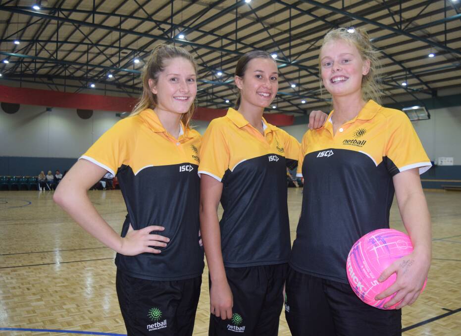 Harmony Sutherland, Brooke Gibson and Riley Culnane live and breathe netball, representing their city, region and state. Image Sophie Elliott.