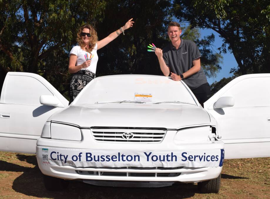 City of Busselton youth development officer Angela Griffin and youth development trainee Tyson Vincent are excited to see the impounded car's transformation. Image Sophie Elliott.